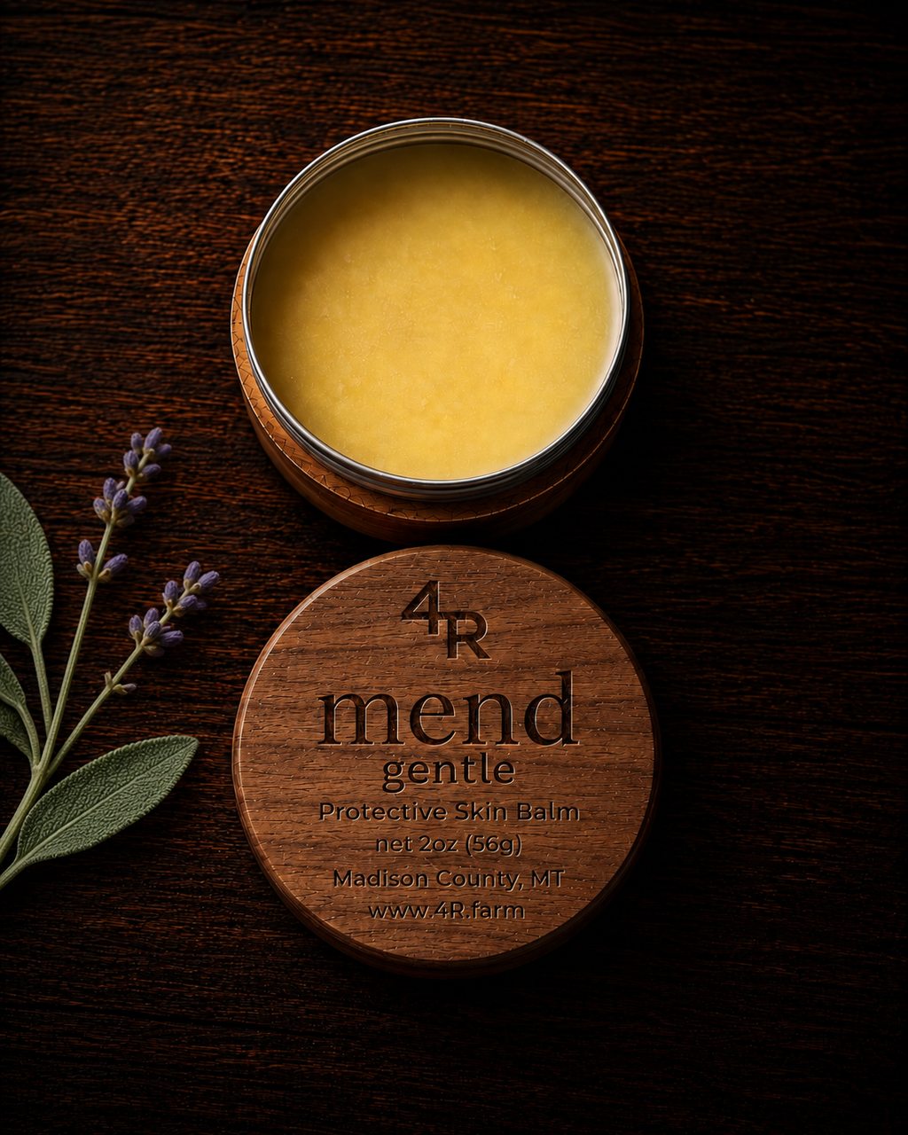 Open MEND GENTLE Protective Skin Balm beside its walnut lid on dark wood