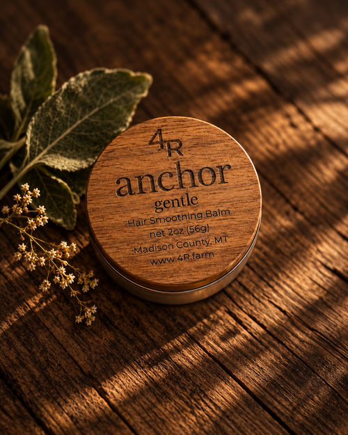 ANCHOR GENTLE Hair Smoothing Balm in a walnut-lidded tin with sage and dried flowers