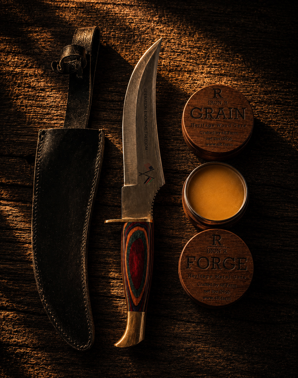 Fixed-blade knife and leather sheath displayed with IRON R GRAIN and FORGE care balms.