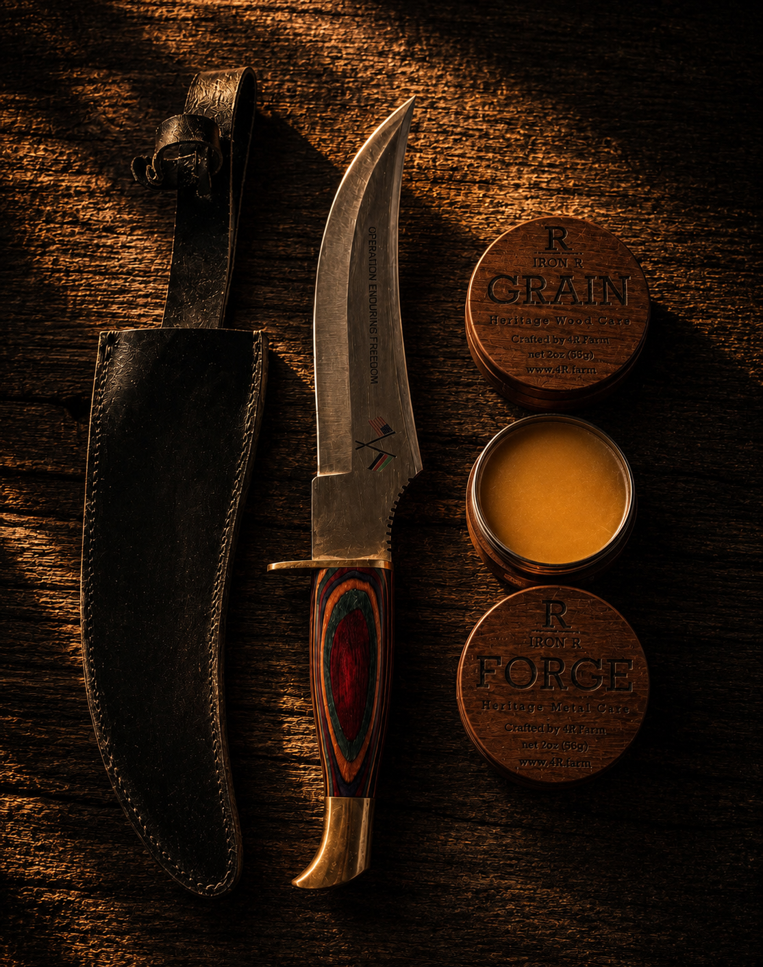 Fixed-blade knife and leather sheath displayed with IRON R GRAIN and FORGE care balms.