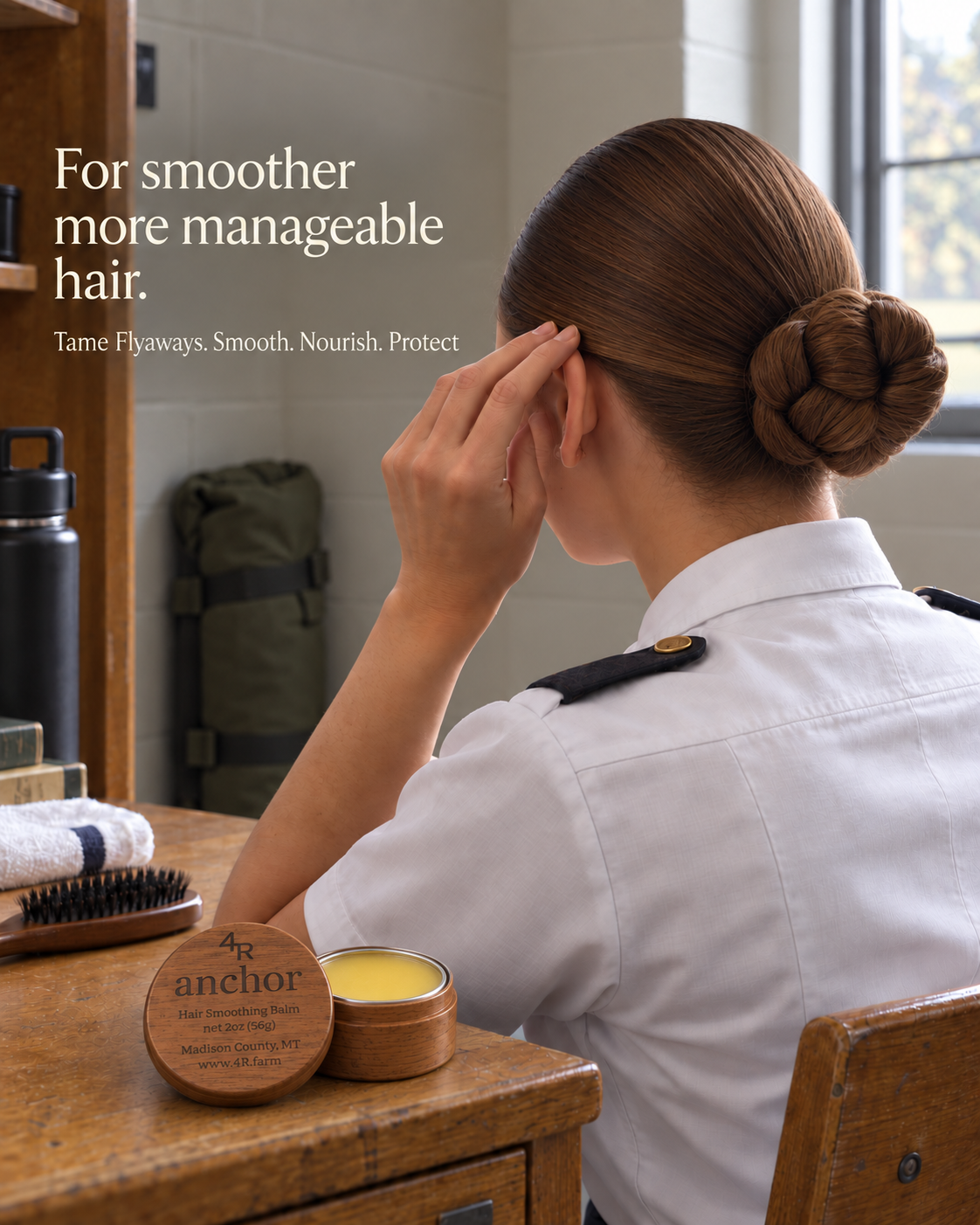 Woman smoothing a neat bun beside the words “For smoother, more manageable hair.”