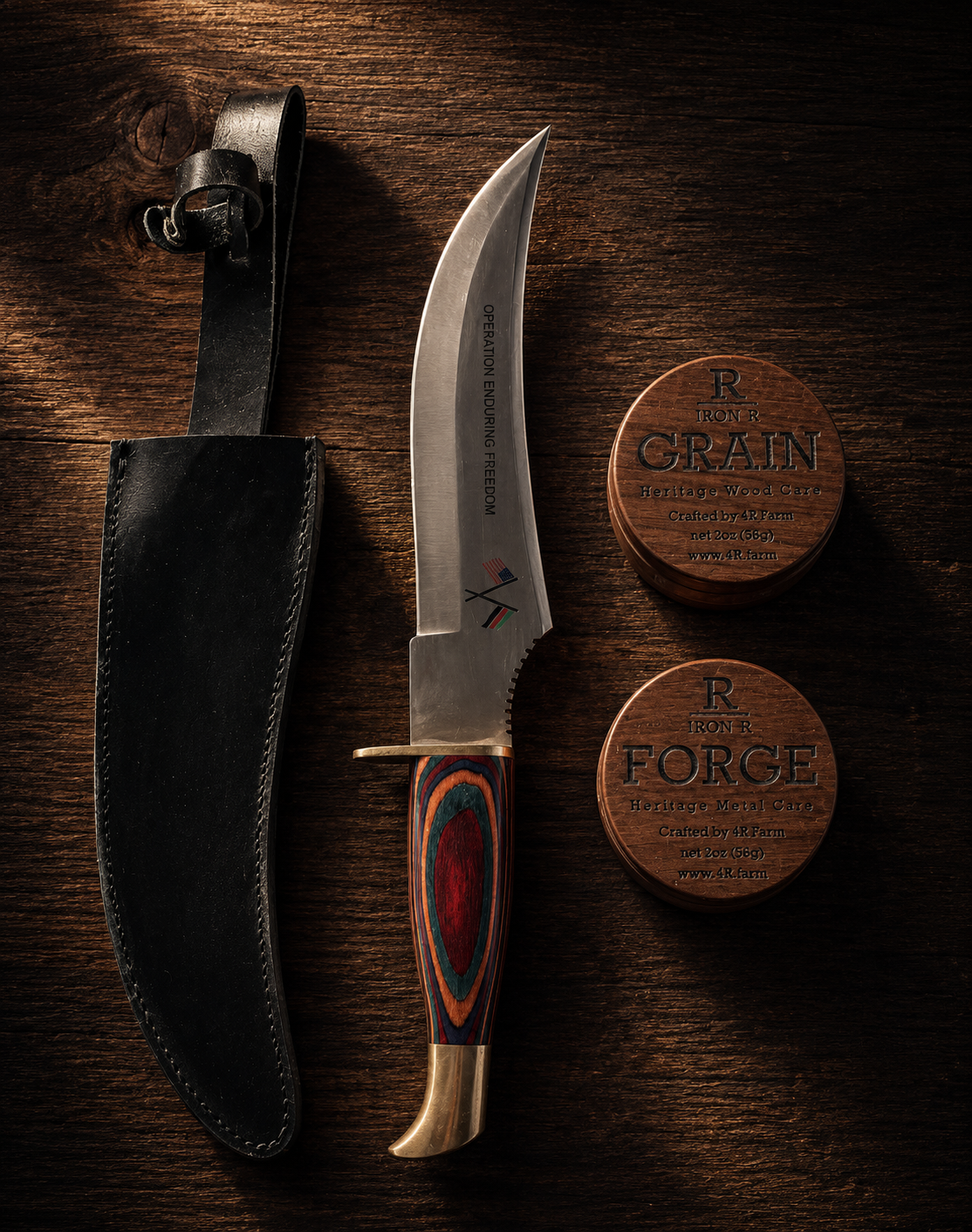 Fixed-blade knife and leather sheath displayed with IRON R GRAIN and FORGE care balms.
