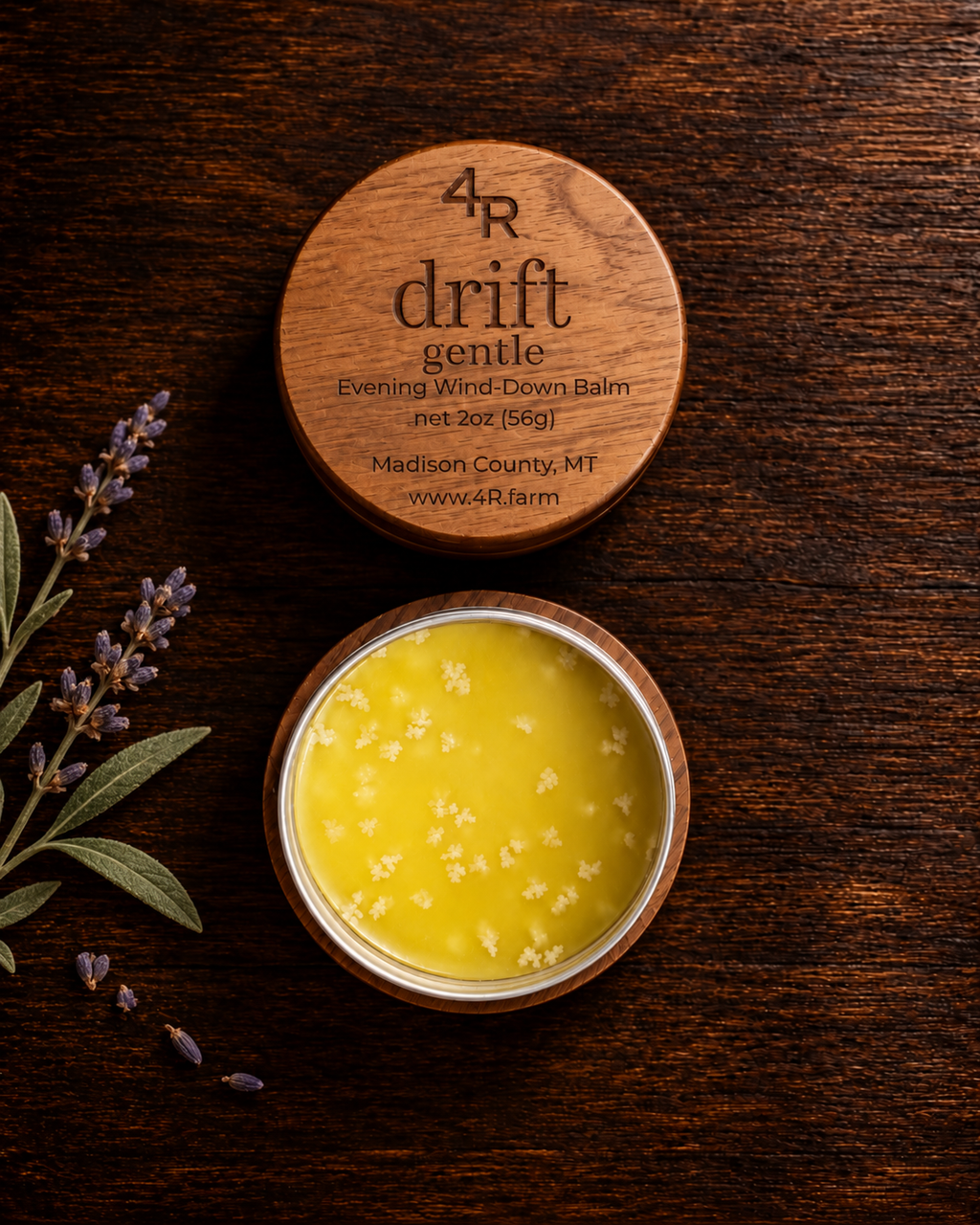 Open DRIFT GENTLE Evening Wind-Down Balm beside its walnut lid on dark wood