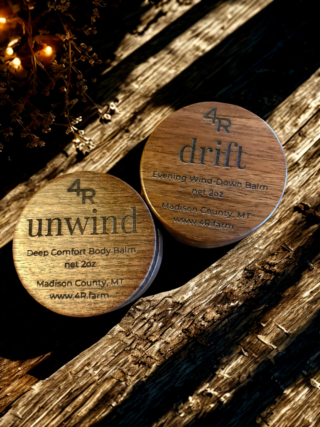 Two wooden containers labeled 'unwind' and 'drift' on a wooden surface.