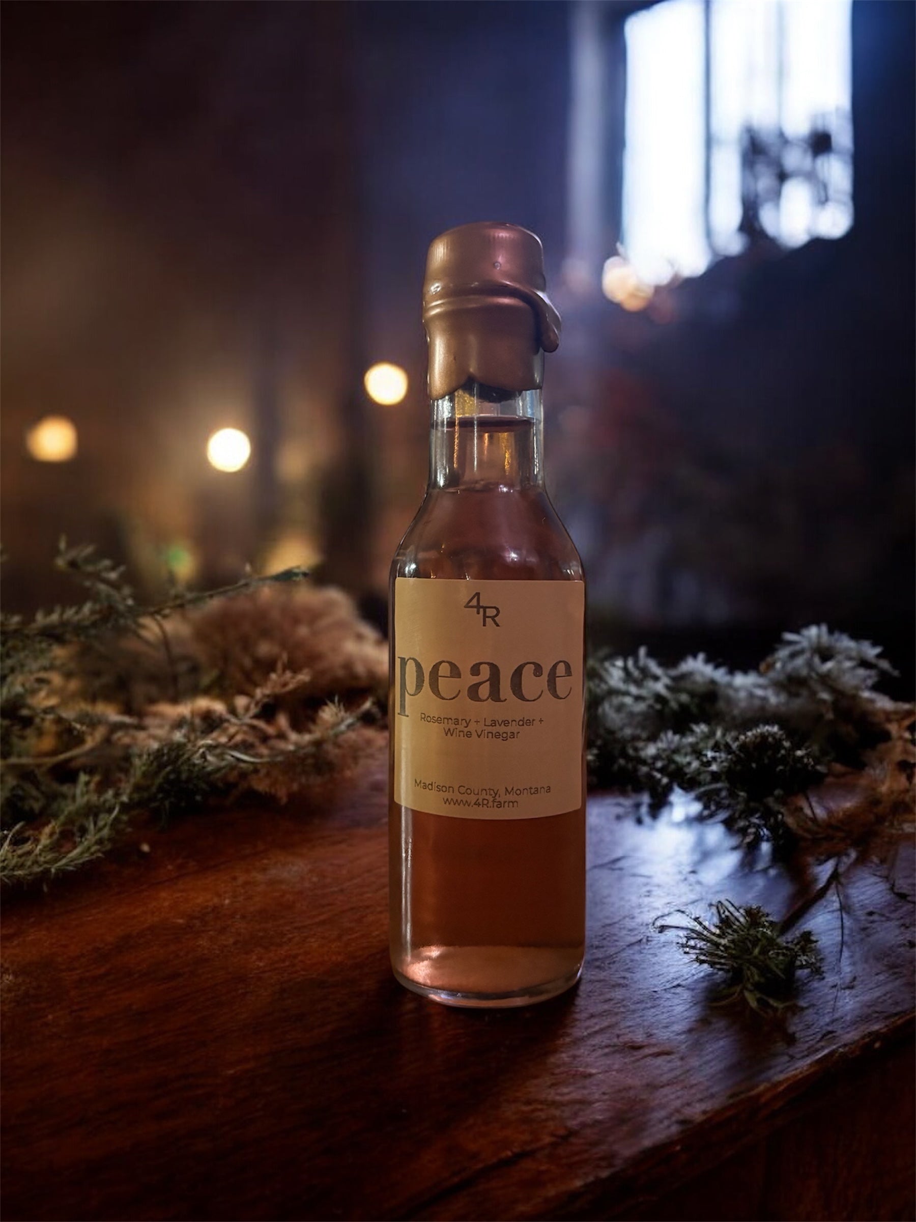 Bottle of 4R Peace on a wooden surface with a blurred background